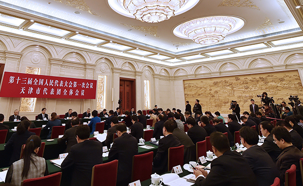 新华社照片，北京，2018年3月6日 
    天津代表团全体会议向媒体开放 
    3月6日，十三届全国人大一次会议天津代表团全体会议向媒体开放。 
    新华社记者 李然 摄