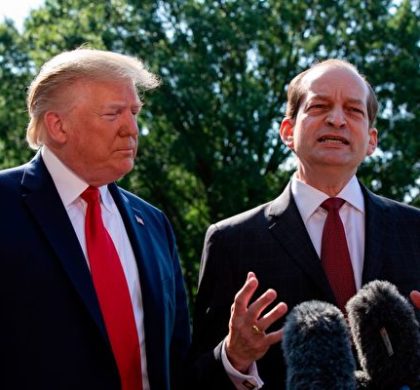US President Donald Trump (L) listens to US Labor Secretary Alexander Acosta as he speaks to the media early July 12, 2019 at the White House in Washington, DC. - Alex Acosta announced his resignation as US labor secretary Friday, amid criticism of a secret plea deal he negotiated a decade ago with Jeffrey Epstein, the financier accused of sexually abusing young girls. "I called the president this morning and told him that I thought the right thing was to step aside," Acosta said in a joint appearance with President Donald Trump at the White House. (Photo by Alastair Pike / AFP)        (Photo credit should read ALASTAIR PIKE/AFP/Getty Images)