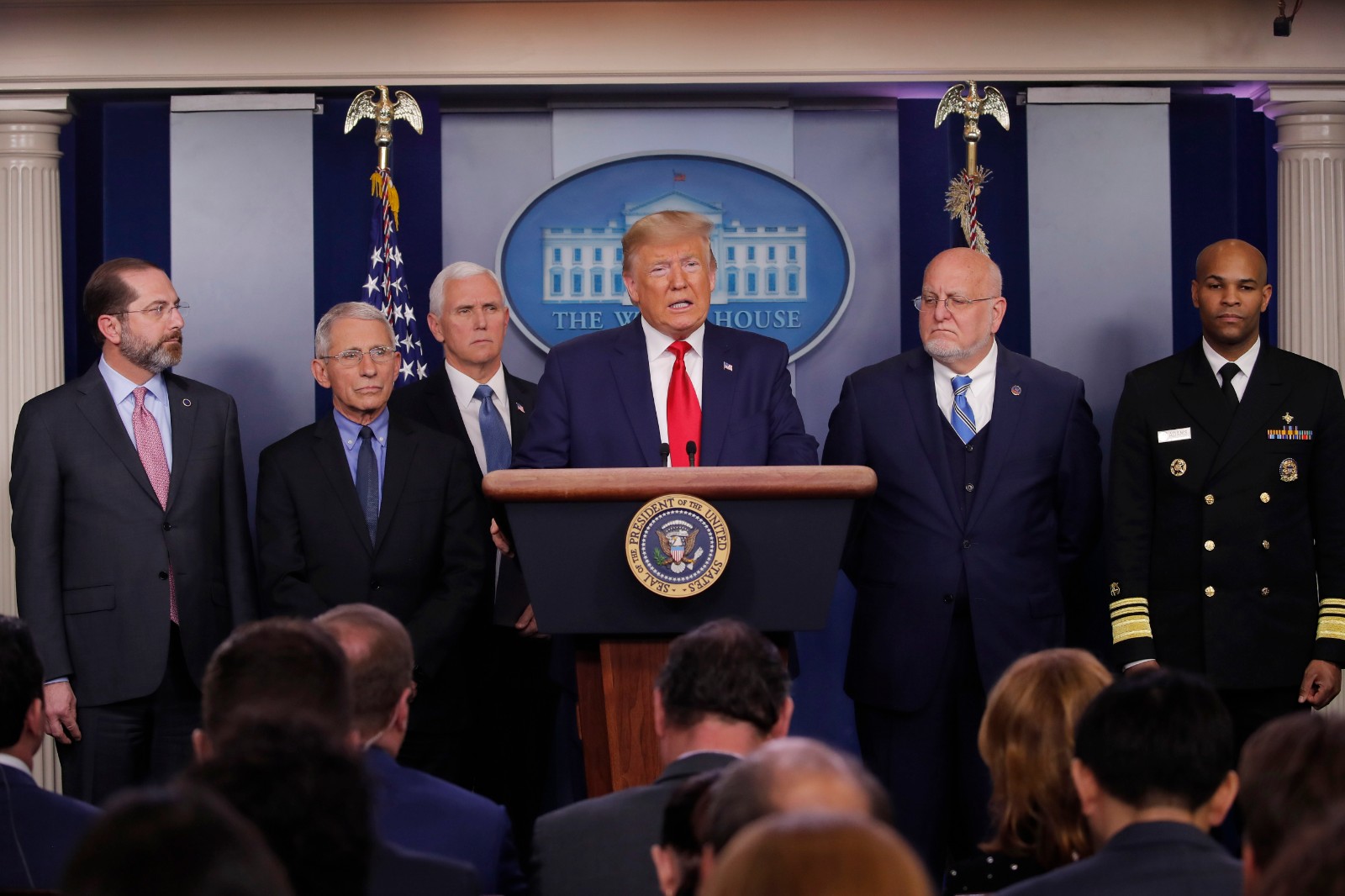 President Donald Trump speaks about the coronavirus in the press briefing room at the White House, Saturday, Feb. 29, 2020, in Washington as Health and Human Services Secretary Alex Azar, National Institute for Allergy and Infectious Diseases Director Dr. Anthony Fauci, Vice President Mike Pence, Robert Redfield, director of the Centers for Disease Control and Prevention and U.S. Surgeon General Dr. Jerome Adams listen. (AP Photo/Carolyn Kaster)