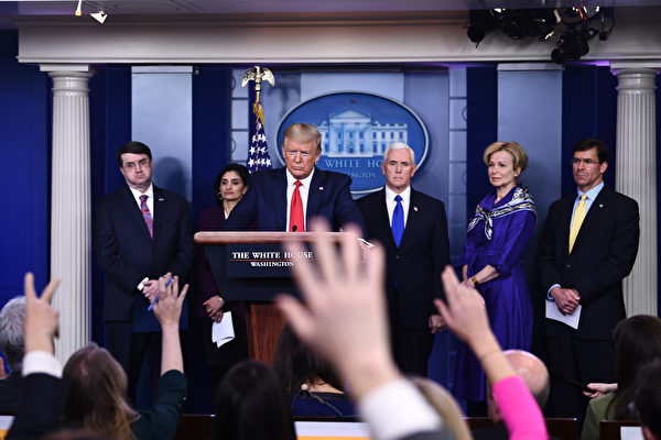 US President Donald Trump takes a question during the daily briefing on the novel coronavirus, COVID-19, at the White House on March 18, 2020, in Washington, DC. - Trump ordered the suspension of evictions and mortgage foreclosures for six weeks as part of the government effort to ease the economic pain from the coronavirus pandemic. (Photo by Brendan Smialowski / AFP)