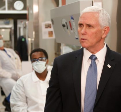 Vice President Mike Pence visits the molecular testing lab at Mayo Clinic Tuesday, April 28, 2020, in Rochester, Minn., where he toured the facilities supporting COVID-19 research and treatment. Pence chose not to wear a face mask while touring the Mayo Clinic in Minnesota. It's an apparent violation of the world-renowned medical center's policy requiring them. (AP Photo/Jim Mone)