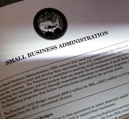 Proposals for the Small Business Administration (SBA) in President Donald Trump's first budget are displayed at the Government Printing Office in Washington, Thursday, March, 16, 2017. The $1.15 trillion presentation proposes a reordering of national spending priorities, pumping significantly more money into the military and homeland security while sharply cutting foreign aid, medical research and the arts. The document also proposes money for the U.S.-Mexico border wall Trump vowed in his campaign to have Mexico finance. The EPA also takes a big hit in the budget proposal. (AP Photo/J. Scott Applewhite)