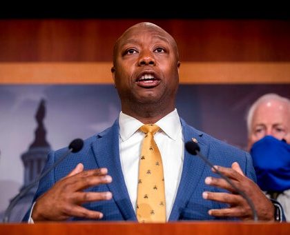 Sen. Tim Scott, R-S.C., accompanied by Republican senators speaks at a news conference to announce a Republican police reform bill on Capitol Hill, Wednesday, June 17, 2020, in Washington. (AP Photo/Andrew Harnik)
