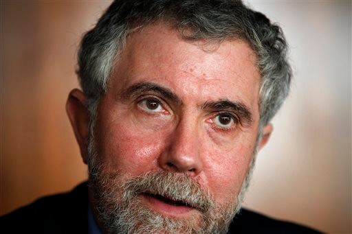 American economy Nobel Prize laureate Paul Krugman talks to journalists during a news conference before being awarded an Honoris Causa degree by Lisbon University, Lisbon Technical University and Lisbon Nova University Monday, Feb. 27, 2012 in Lisbon. (AP Photo/ Francisco Seco)
