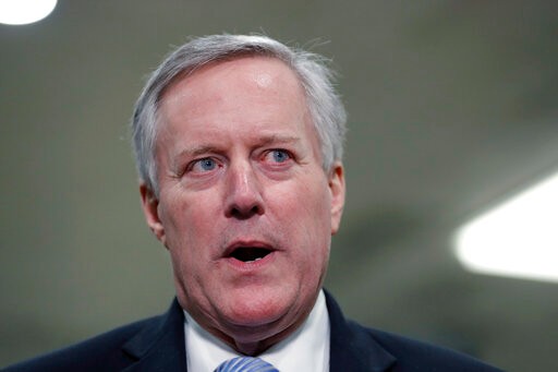 Rep. Mark Meadows, R-N.C., talks to reporters in the basement of the U.S. Capitol in Washington, Thursday, Jan. 30, 2020, during the impeachment trial of President Donald Trump on charges of abuse of power and obstruction of Congress. (AP Photo/Julio Cortez)