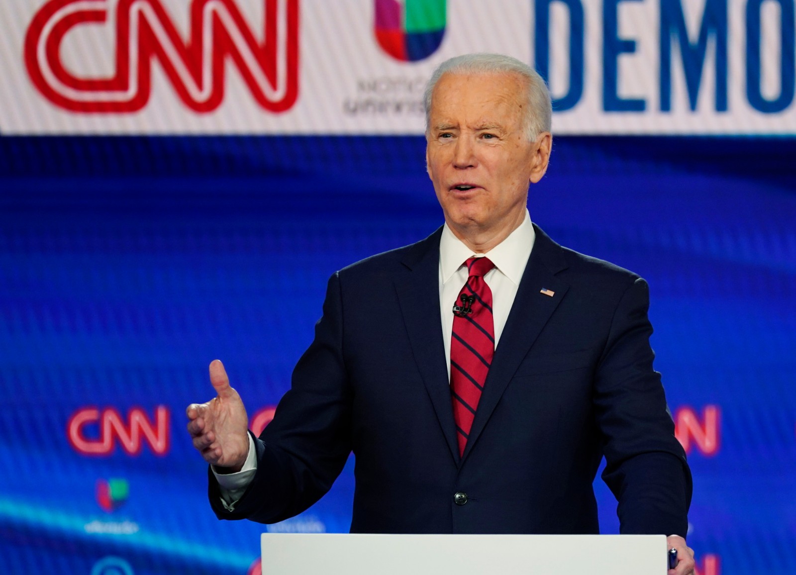 In this Sunday, March 15, 2020, photo, former Vice President Joe Biden, with Sen. Bernie Sanders, I-Vt., speaks during a Democratic presidential primary debate at CNN Studios in Washington. What might be the final showdown between the two very different Democratic candidates takes place Tuesday, March 17, 2020, during Florida's presidential primary. (AP Photo/Evan Vucci)