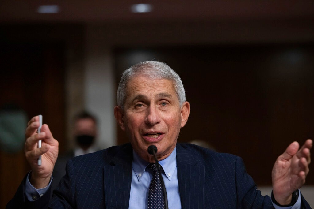 Dr. Anthony Fauci, Director of the National Institute of Allergy and Infectious Diseases at the National Institutes of Health, listens during a Senate Senate Health, Education, Labor, and Pensions Committee Hearing on the federal government response to COVID-19 Capitol Hill on Wednesday, Sept. 23, 2020, in Washington. (Graeme Jennings/Pool via AP)