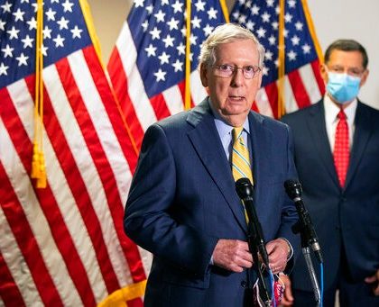 Senate Majority Leader Mitch McConnell, R-Ky., with Sen. John Barrasso, R-Wyo., speaks to reporters following a GOP policy meeting on Capitol Hill, Tuesday, June 30, 2020, in Washington. (AP Photo/Manuel Balce Ceneta)