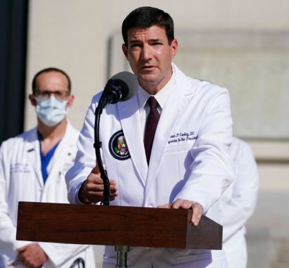 Dr. Sean Conley, physician to President Donald Trump, talks with reporters at Walter Reed National Military Medical Center, Monday, Oct. 5, 2020, in Bethesda, Md. (AP Photo/Evan Vucci)