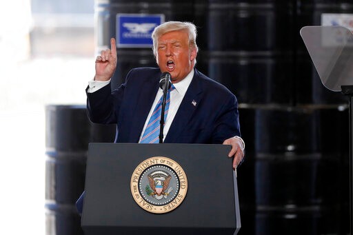 President Donald Trump delivers remarks about American energy production during a visit to the Double Eagle Energy Oil Rig, Wednesday, July 29, 2020, in Midland, Texas. (AP Photo/Tony Gutierrez)