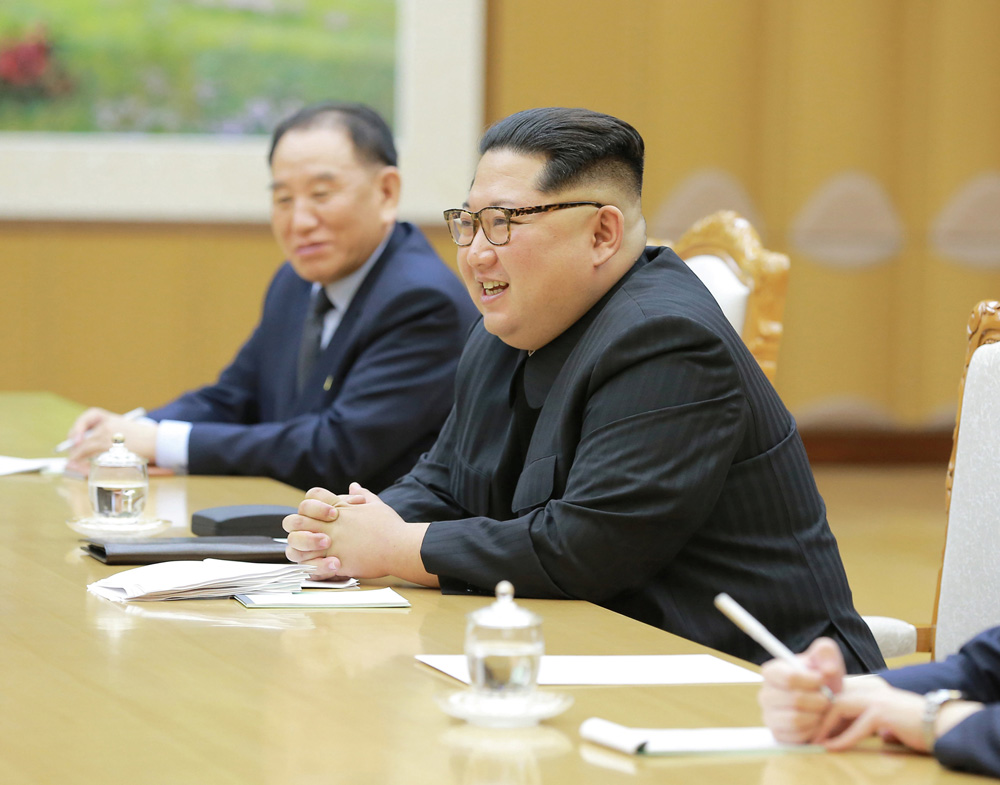 North Korean leader Kim Jong Un meets members of the special delegation of South Korea's President in this photo released by North Korea's Korean Central News Agency (KCNA) on March 6, 2018. KCNA/via Reuters   ATTENTION EDITORS - THIS PICTURE WAS PROVIDED BY A THIRD PARTY. REUTERS IS UNABLE TO INDEPENDENTLY VERIFY THE AUTHENTICITY, CONTENT, LOCATION OR DATE OF THIS IMAGE. NO THIRD PARTY SALES. SOUTH KOREA OUT.