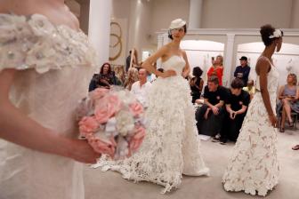 通讯：中国绣娘织出美国新娘婚纱梦——贸易摩擦阴影下的中美婚纱业
