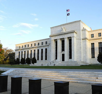 The sun splashes light on the Federal Reserve Building early October 29, 2008 in Washington, DC. The US Federal Reserve was widely expected to deliver another cut in interest rates Wednesday to offer more help to an economy choked by a credit squeeze. AFP PHOTO/Karen BLEIER (Photo credit should read KAREN BLEIER/AFP/Getty Images)