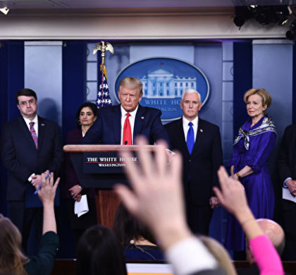 US President Donald Trump takes a question during the daily briefing on the novel coronavirus, COVID-19, at the White House on March 18, 2020, in Washington, DC. - Trump ordered the suspension of evictions and mortgage foreclosures for six weeks as part of the government effort to ease the economic pain from the coronavirus pandemic. (Photo by Brendan Smialowski / AFP)