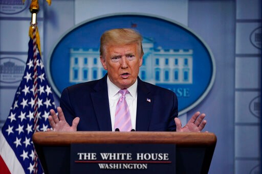 President Donald Trump speaks during a coronavirus task force briefing at the White House, Friday, April 10, 2020, in Washington. (AP Photo/Evan Vucci)