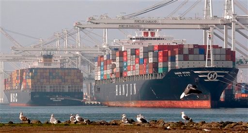 FILE - In this Jan, 5, 2010 file photo, cargo ships wait to be unloaded at the Port of Oakland in Oakland, Calif. The U.S. trade deficit widened unexpectedly in December to $40.2 billion dollars, the Commerce Department said on Wednesday, Feb. 10, 2010, in a monthly report.(AP Photo/Ben Margot)