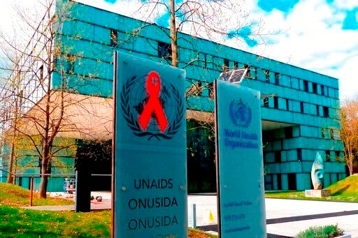 This Monday, April 8, 2019 photo shows the headquarters building of UNAIDS in Geneva. Documents obtained by The Associated Press reveal the U.N.’s AIDS agency is grappling with previously unreported allegations of financial and sexual misconduct involving a staffer who went public in 2018 with claims she was sexually assaulted by a top deputy. (AP Photo/Jamey Keaten)