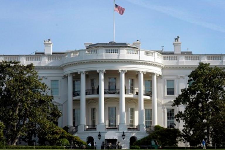 The White House, seen from the South Lawn in Washington, gives the media a preview of the White House gardens and grounds on Saturday, April 21, 2012, prior to the official opening of the Garden Tours to the public. (AP Photo/Susan Walsh)