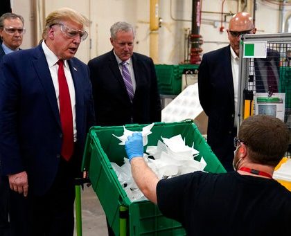 President Donald Trump participates in a tour of a Honeywell International plant that manufactures personal protective equipment, Tuesday, May 5, 2020, in Phoenix. (AP Photo/Evan Vucci)