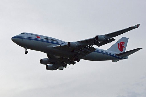 A chartered Air China 747 lands in Singapore suspected to pick up North Korea leader Kim Jong Un on Tuesday, June 12, 2018, after his summit today with U.S. leader Donald Trump. (AP Photo/Joseph Nair)