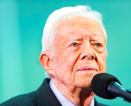 Former President Jimmy Carter takes questions submitted by students during an annual Carter Town Hall held at Emory University Wednesday, Sept. 18, 2019, in Atlanta. (AP Photo/John Amis)