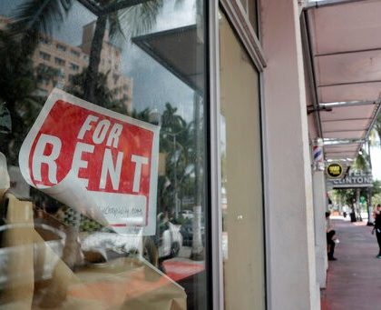 A For Rent sign hangs on a closed shop during the coronavirus pandemic, Monday, July 13, 2020, in Miami Beach, Fla. (AP Photo/Lynne Sladky)