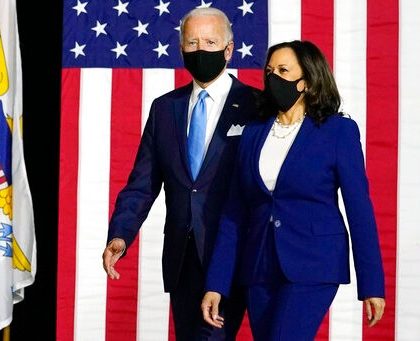 Democratic presidential candidate former Vice President Joe Biden and his running mate Sen. Kamala Harris, D-Calif., arrive to speak at a news conference at Alexis Dupont High School in Wilmington, Del., Wednesday, Aug. 12, 2020. (AP Photo/Carolyn Kaster)