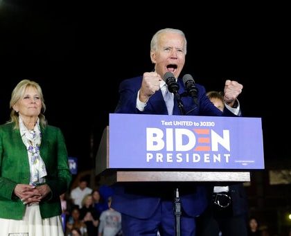 Democratic presidential candidate former Vice President Joe Biden, right, speaks next to his wife Jill during a primary election night rally Tuesday, March 3, 2020, in Los Angeles. (AP Photo/Marcio Jose Sanchez)